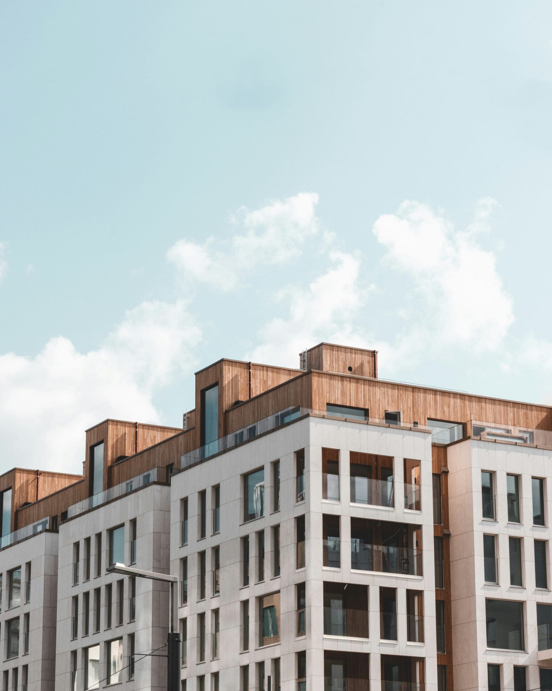 Multifamily apartment building with factory-direct windows and doors supplied by NexVue Exteriors