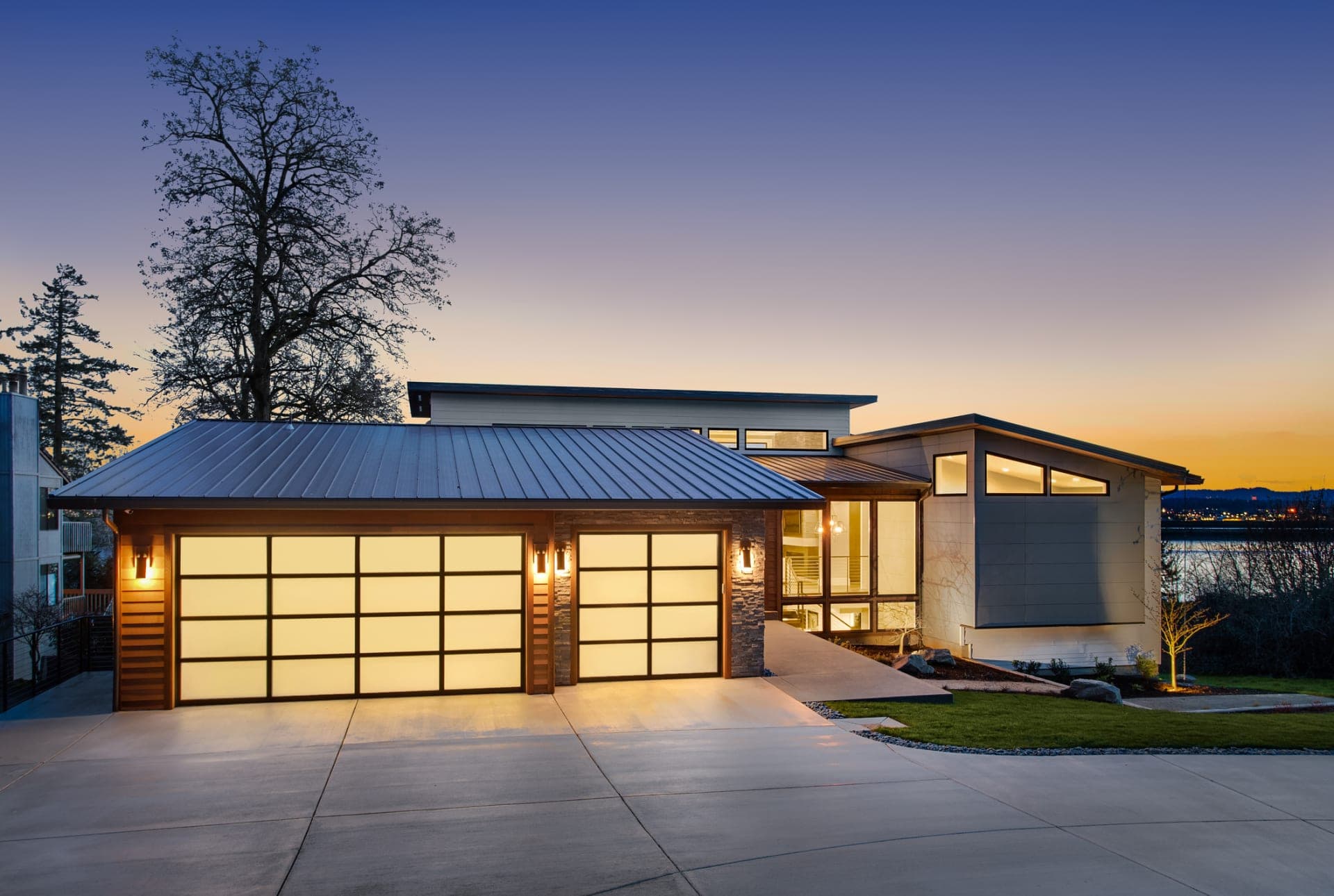 Beautiful Denver home with premium garage doors at sunset — NexVue Exteriors